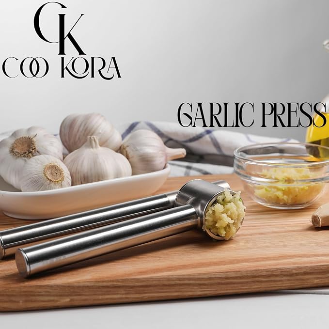 COO KORA Heavy Duty Garlic Press, Handheld Garlic Mincer, 304 Stainless Steel Garlic Press, Ergonomic, Durable, No Hand Odor, Just Put It in the Bowl, Dishwasher Safe