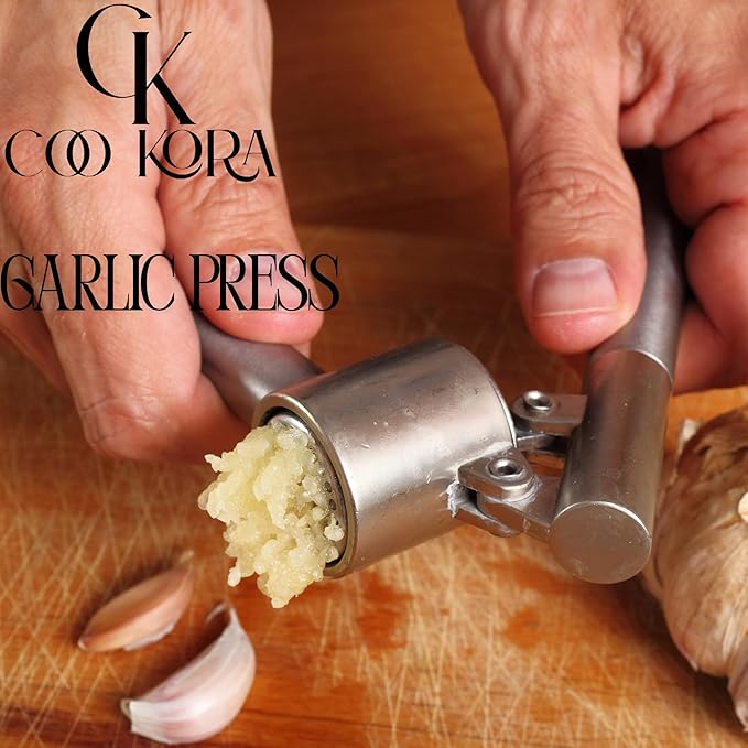COO KORA Heavy Duty Garlic Press, Handheld Garlic Mincer, 304 Stainless Steel Garlic Press, Ergonomic, Durable, No Hand Odor, Just Put It in the Bowl, Dishwasher Safe