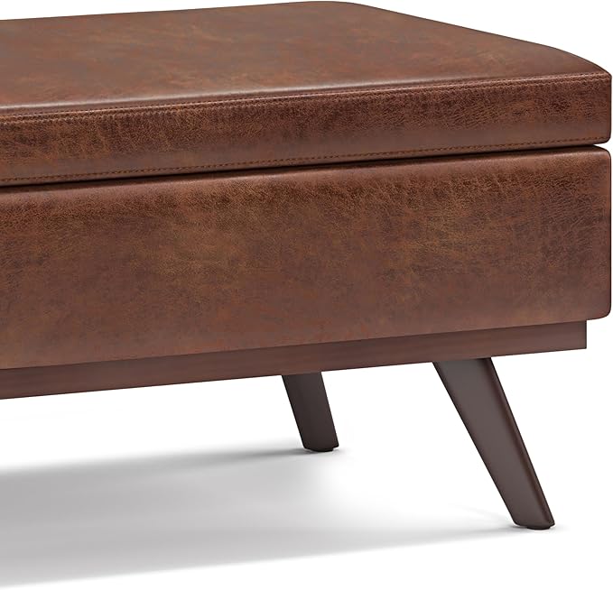 SIMPLIHOME Owen Lift Top Coffee Table Storage Ottoman - 42 inch Wide Upholstered Vegan Leather Rectangular Lift-Top Ottoman in Distressed Saddle Brown, Mid-Century Modern Ottoman for Living Room