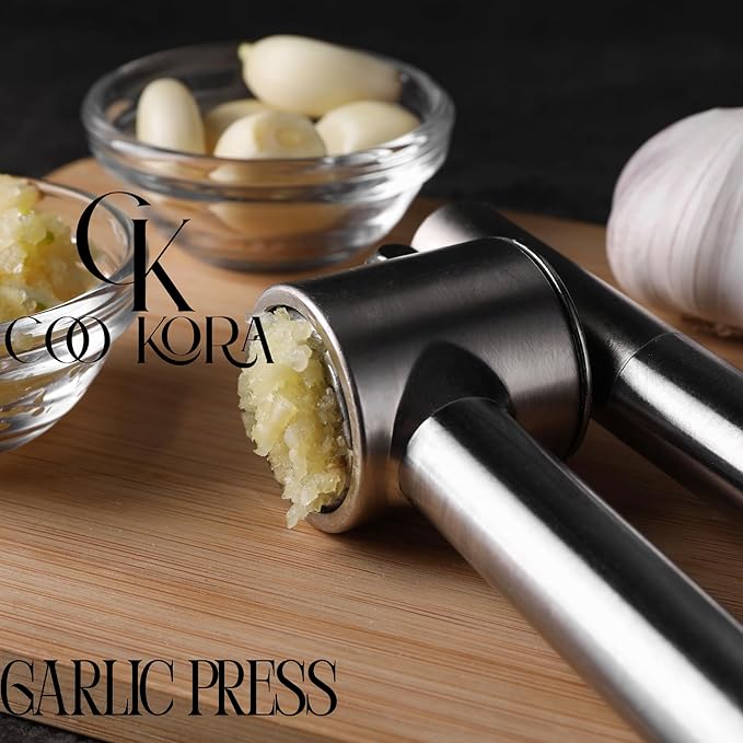 COO KORA Heavy Duty Garlic Press, Handheld Garlic Mincer, 304 Stainless Steel Garlic Press, Ergonomic, Durable, No Hand Odor, Just Put It in the Bowl, Dishwasher Safe