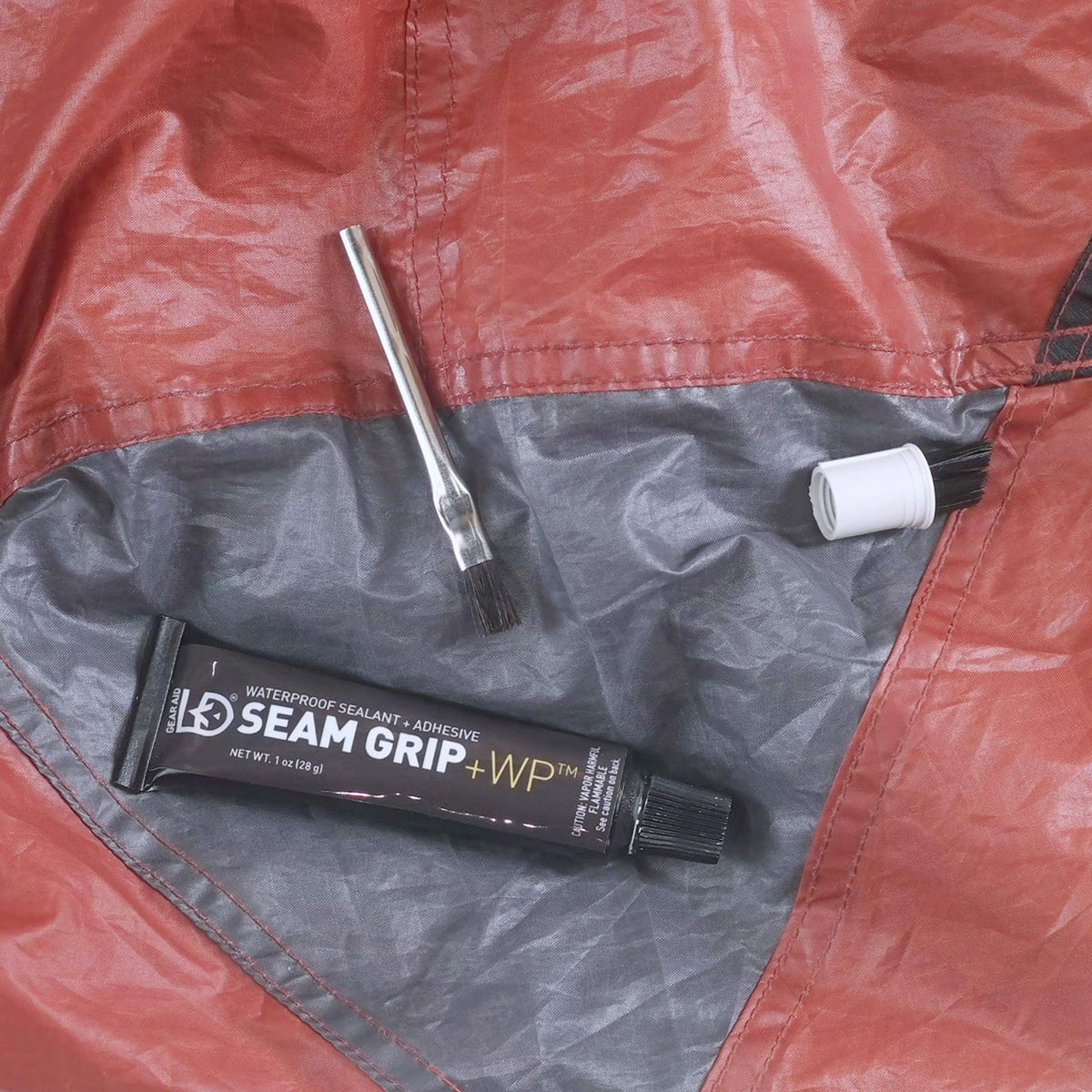 GEAR AID Seam Grip WP Waterproof Sealant and Adhesive for Jackets, Tents, Tarps, Rain Gear and Outdoor Fabric, Repairs Rips and Seals Seams on Nylon, Canvas, Vinyl, 1 oz Tube Seals 12 ft, 1 Pack